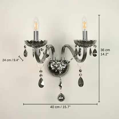 Wall-mounted two-light sconce with dark smoked glass cups, clear teardrop crystal drops, and visible bulb filaments, 36 x 40 x 24 cm (14.2 x 15.7 x 9.4 inches) dimensions