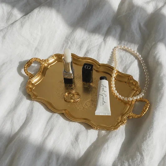 Luxury gold metal serving tray for coffee table dining table and elegant home decor styling with decorative accents.