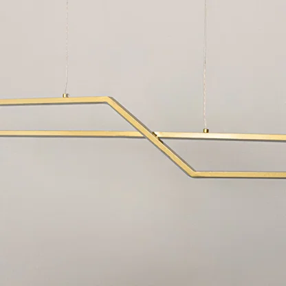 Geometric gold metal chandelier closeup highlighting angular linear design and suspended structure for contemporary ceiling lighting style.