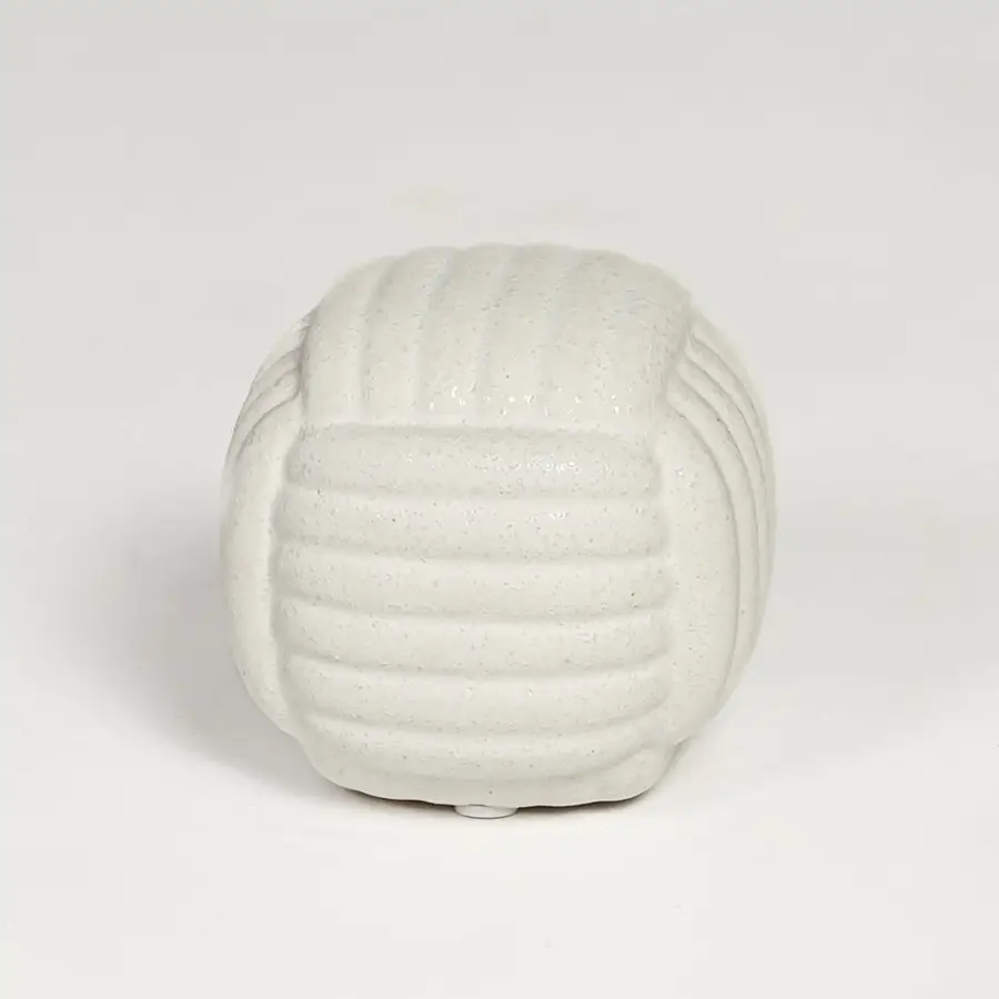 White ceramic textured decorative jar with rounded sculpted design isolated on clean white background for elegant tabletop display.