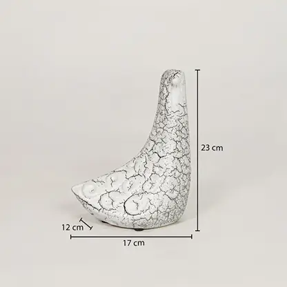 White ceramic bird decor accent measuring 25 cm height and 17 cm width for elegant tabletop decor styling.