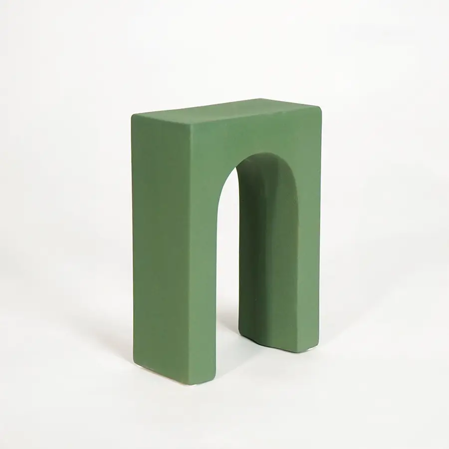 Green wooden decorative display stand for shelf console table and modern home decor on white background image.