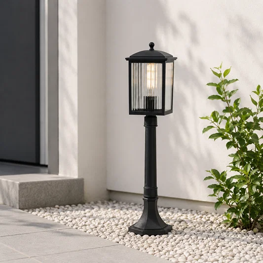 Traditional black aluminum outdoor garden post lamp light with fluted glass shade for villa gravel pathway walkway styling.