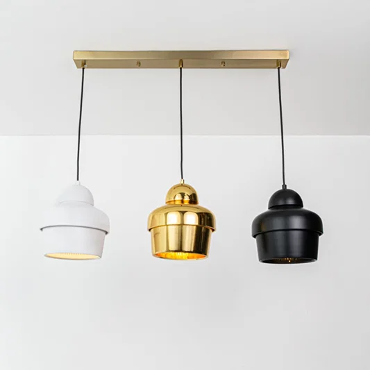 White gold and black metal pendant lights designed for stylish modern home decor interiors.