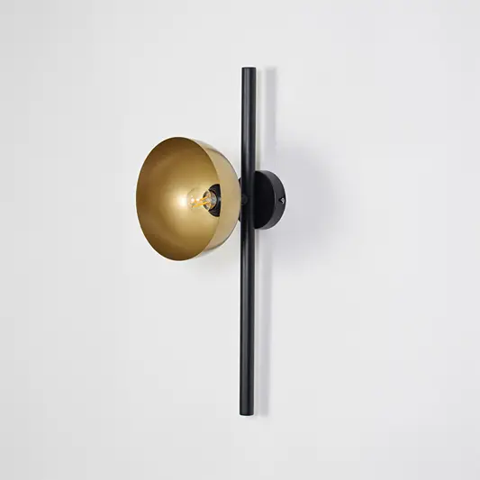 Wall light off on white background featuring gold round shade with sleek black mounting bar for minimalist product display.