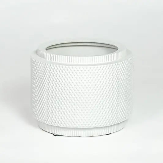 White ceramic planter with textured woven pattern and round shape isolated on white background for modern home decor use.