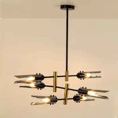 Black and gold metal chandelier with exposed bulbs designed for striking modern ceiling lighting in contemporary interiors.