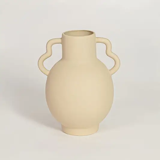 Minimalist beige ceramic flower vase with sculpted handles ideal for entryway table living room shelf or dining decor display.