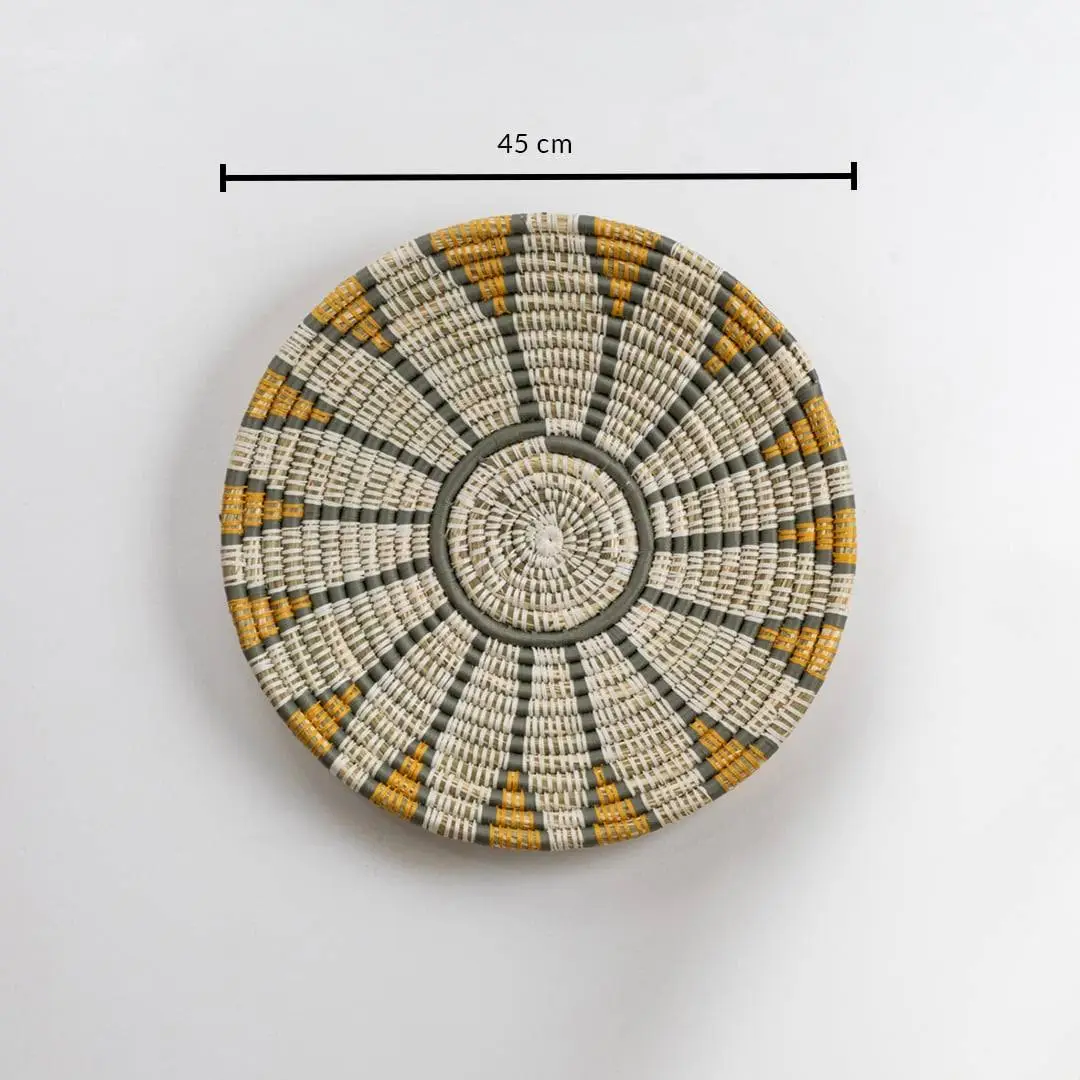 Dimension image of handcrafted natural seagrass wall basket with white grey and mustard pattern for boho wall décor.