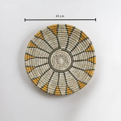 Dimension image of handcrafted natural seagrass wall basket with white grey and mustard pattern for boho wall décor.