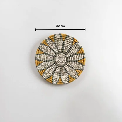Dimension image of handcrafted natural seagrass wall basket with white grey and mustard pattern for boho wall décor.