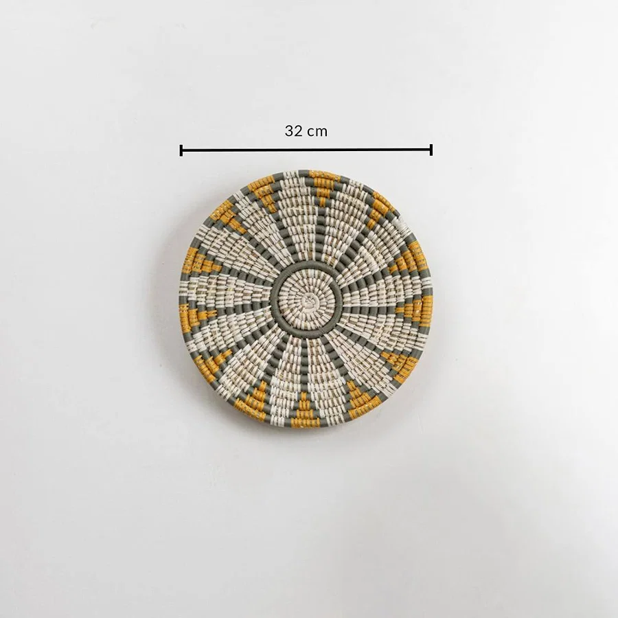 Dimension image of handcrafted natural seagrass wall basket with white grey and mustard pattern for boho wall décor.