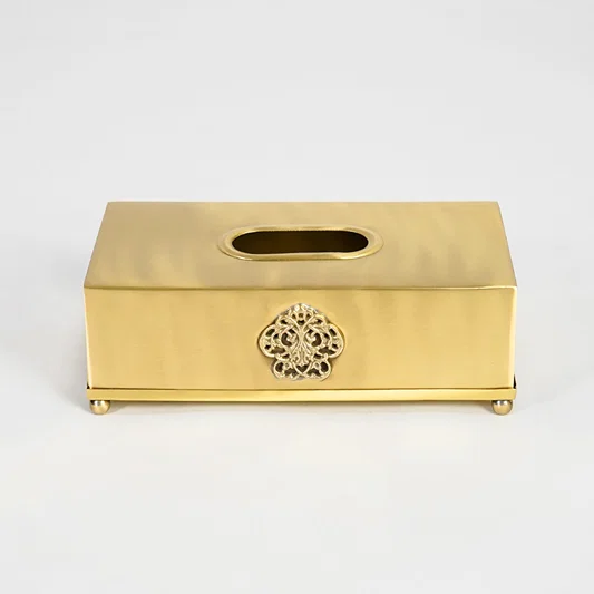 Antique gold metal tissue box holder with ornate floral detailing designed for elegant home and office spaces.