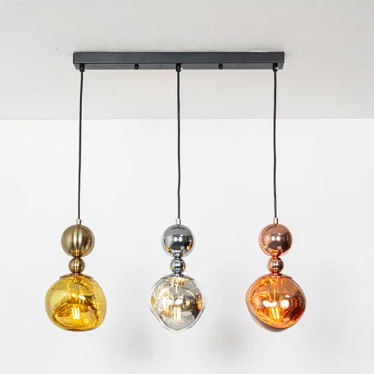 Gold silver and amber glass pendant lights showcasing refined designs for contemporary home decor.