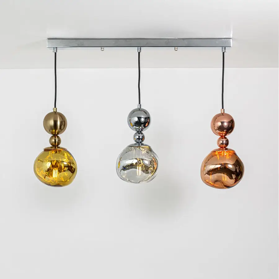 Gold silver and copper metallic glass pendant lights showcasing elegant contemporary home decor.