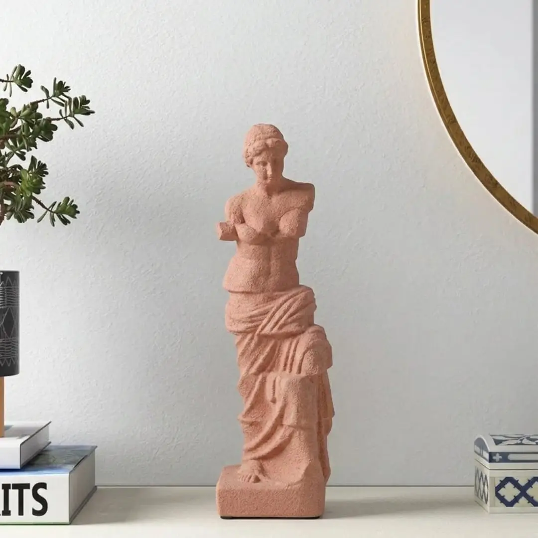 Terracotta resin lady sculpture decor accent placed on console table for elegant modern home decor styling.