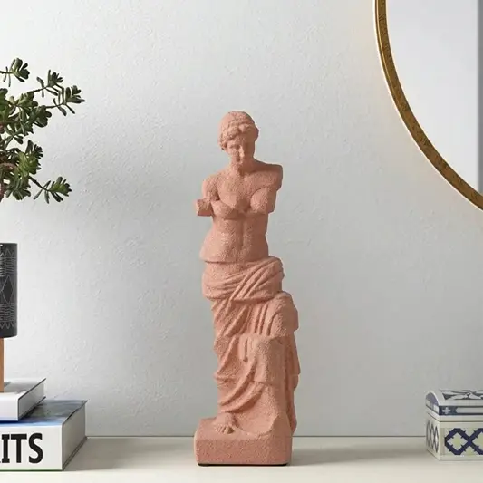 Terracotta resin lady sculpture decor accent placed on console table for elegant modern home decor styling.
