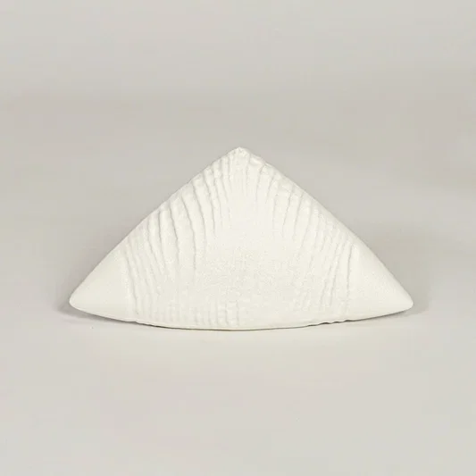 White ceramic abstract decor sculpture with smooth matte texture designed for table shelf or console placement.
