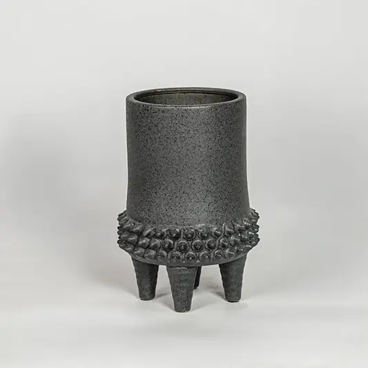 Black ceramic planter vase with textured finish modern decorative pot for tabletop shelf console living room decor styling.