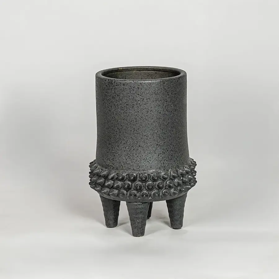 Black ceramic planter vase with textured finish modern decorative pot for tabletop shelf console living room decor styling.