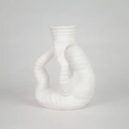 White textured ceramic vase for modern console table placement and elegant indoor home decor styling accent piece.